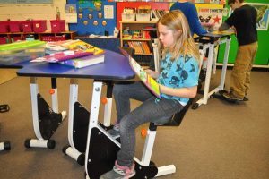 pedal desks schoolkids bored