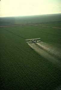 spraying pesticides